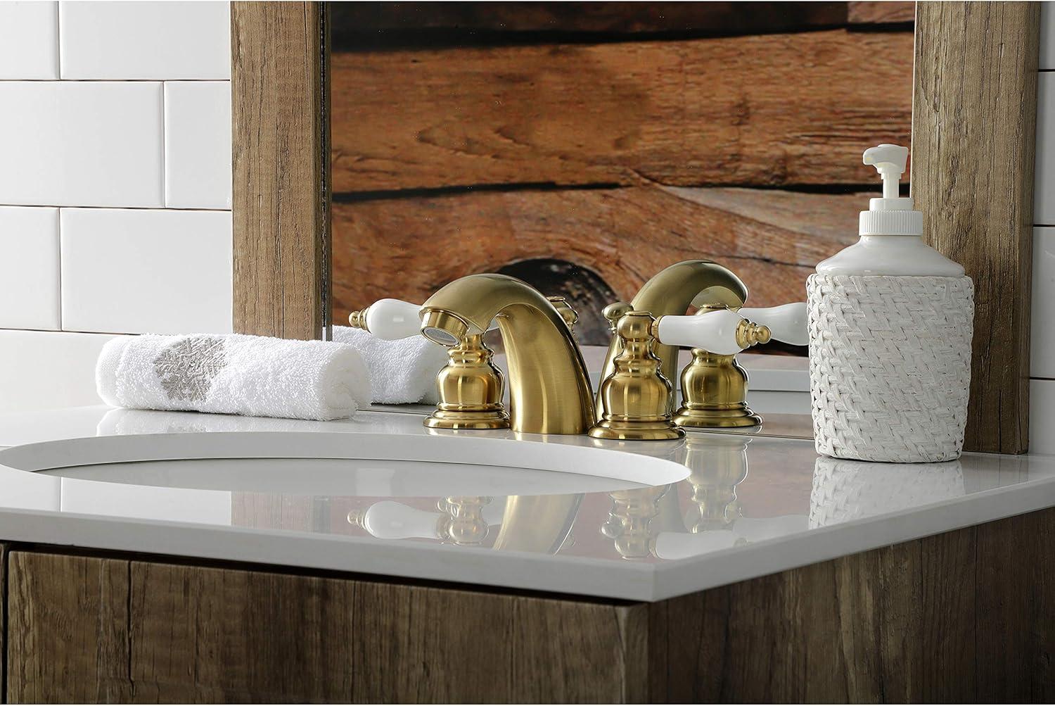 Kingston Brass Victorian Two-Handle 3-Hole Deck Mount Mini-Widespread Bathroom Faucet with Plastic Pop-Up