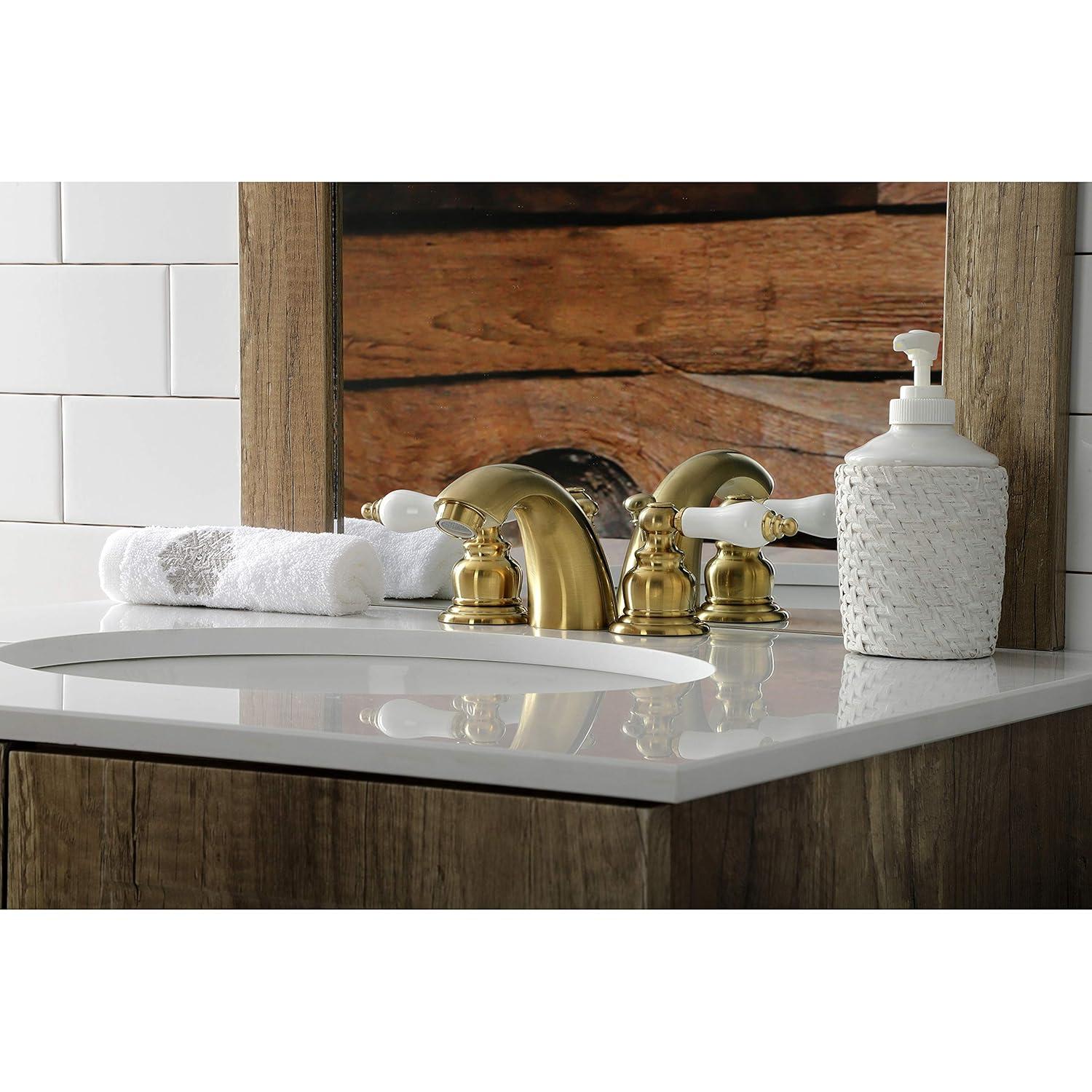 Kingston Brass Victorian Two-Handle 3-Hole Deck Mount Mini-Widespread Bathroom Faucet with Plastic Pop-Up
