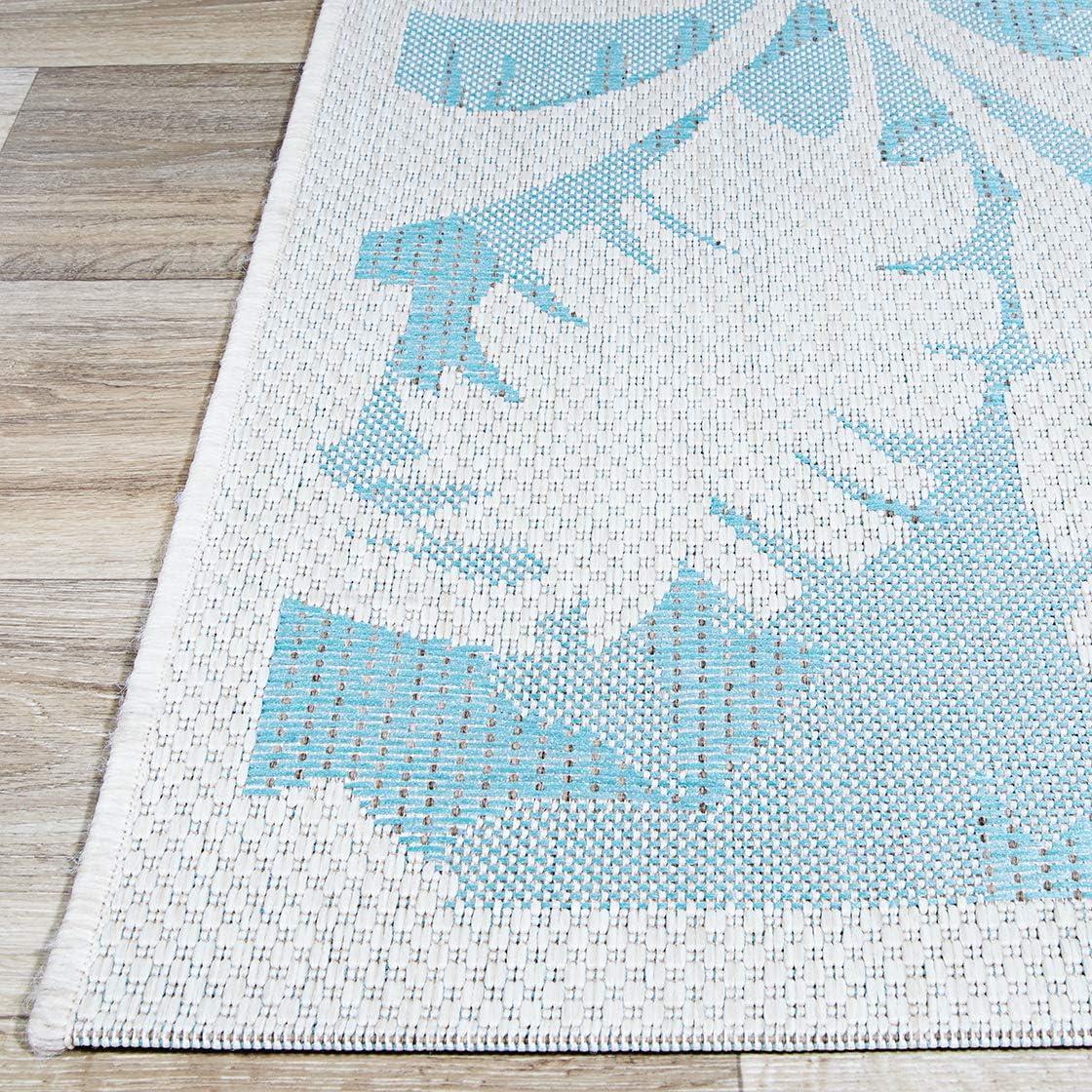 Ivory and Turquoise Synthetic Flat Woven Reversible Area Rug