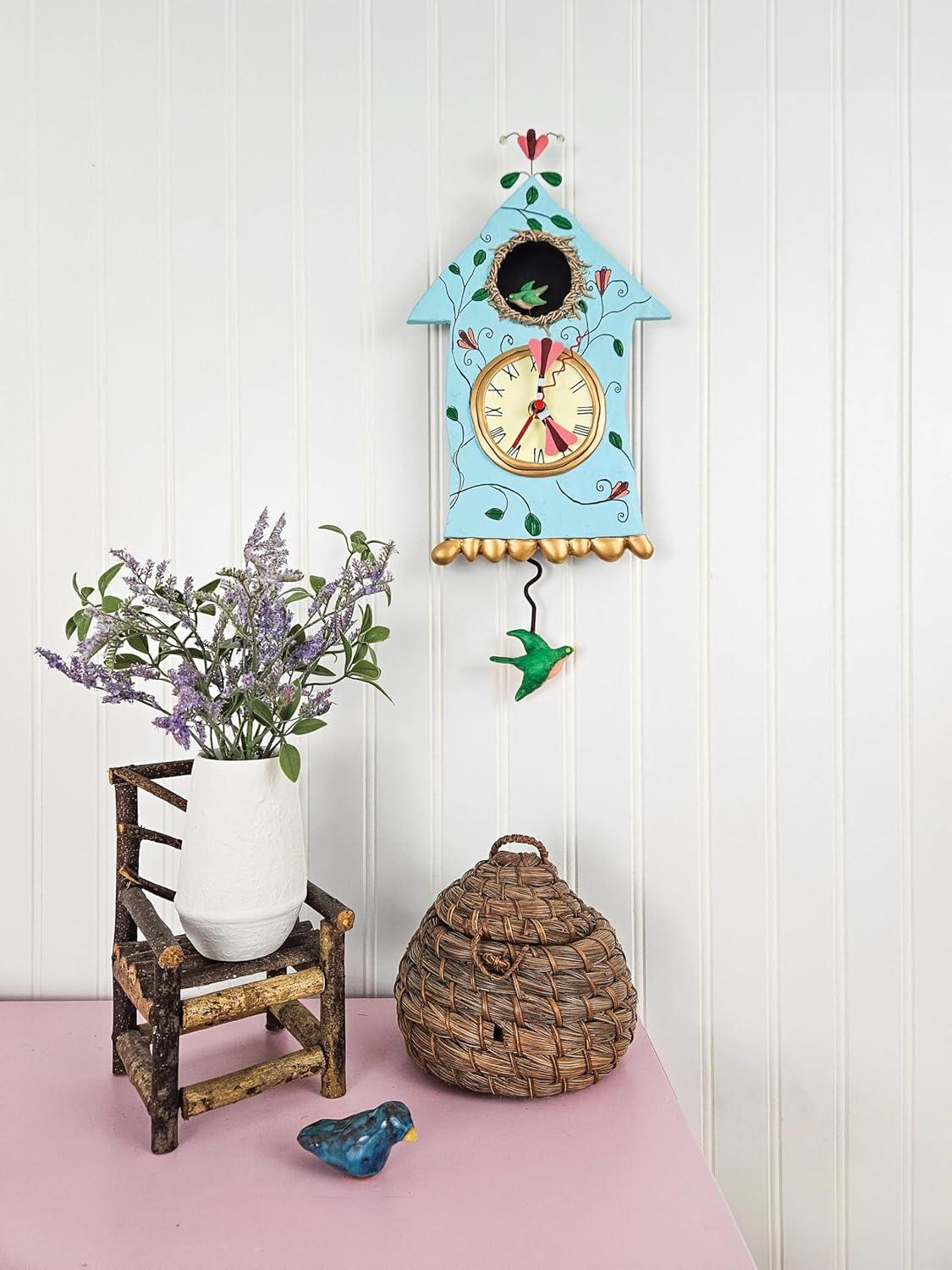 Enesco Allen Designs Birdhouse with Flowers Cuckoo Wall Clock - Battery Operated Pendulum Analog Clock, Stone Resin Decorative Clocks for Walls Home Decor Kitchen Clocks, 14.9 Inch