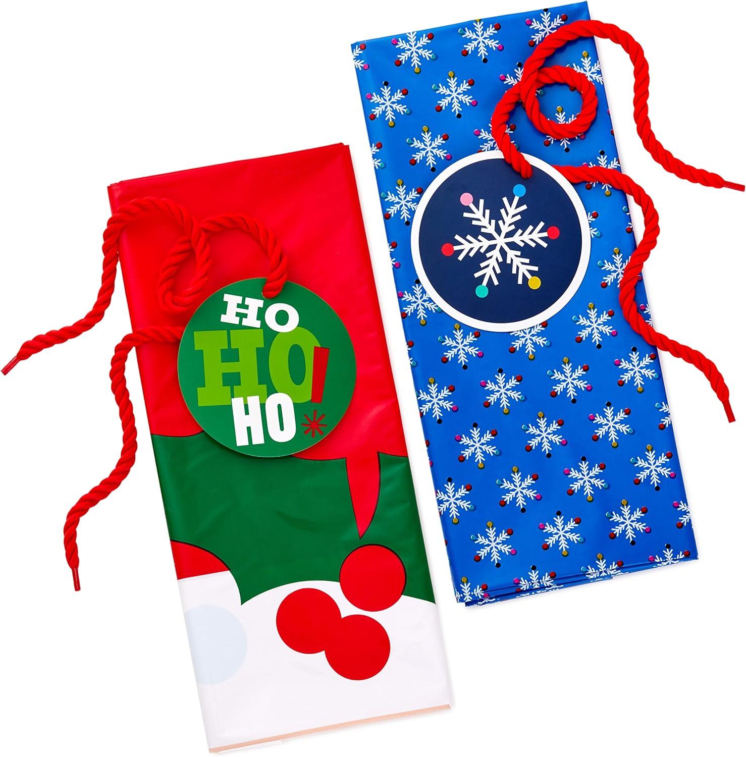 Hallmark Jumbo Plastic Christmas Gift Bags with Gift Tags and Tie Cords (2 Bags: Santa Claus Face, Rainbow Snowflakes on Blue)