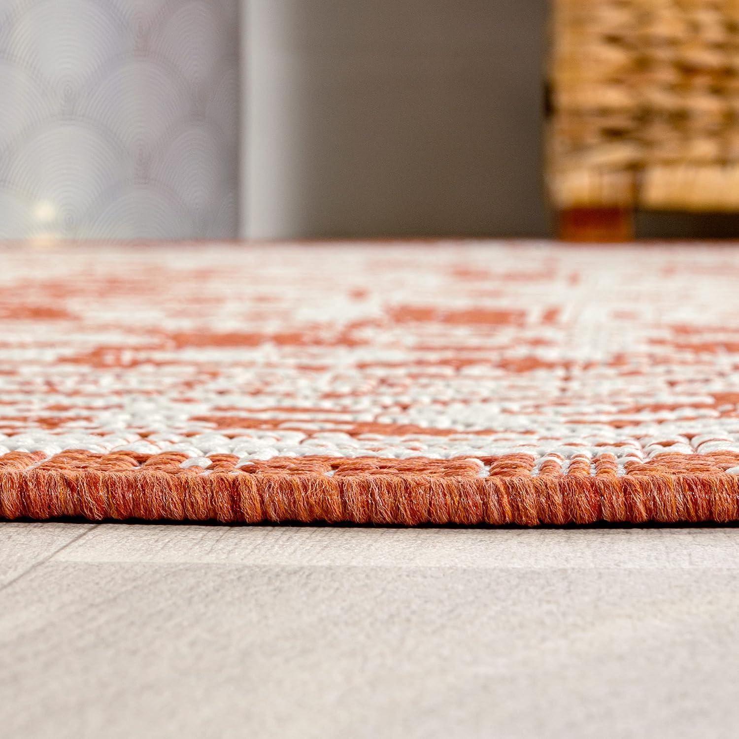 4' x 6' Sinjuri Medallion Textured Weave Indoor/Outdoor Area Rug, Orange/Cream - JONATHAN Y