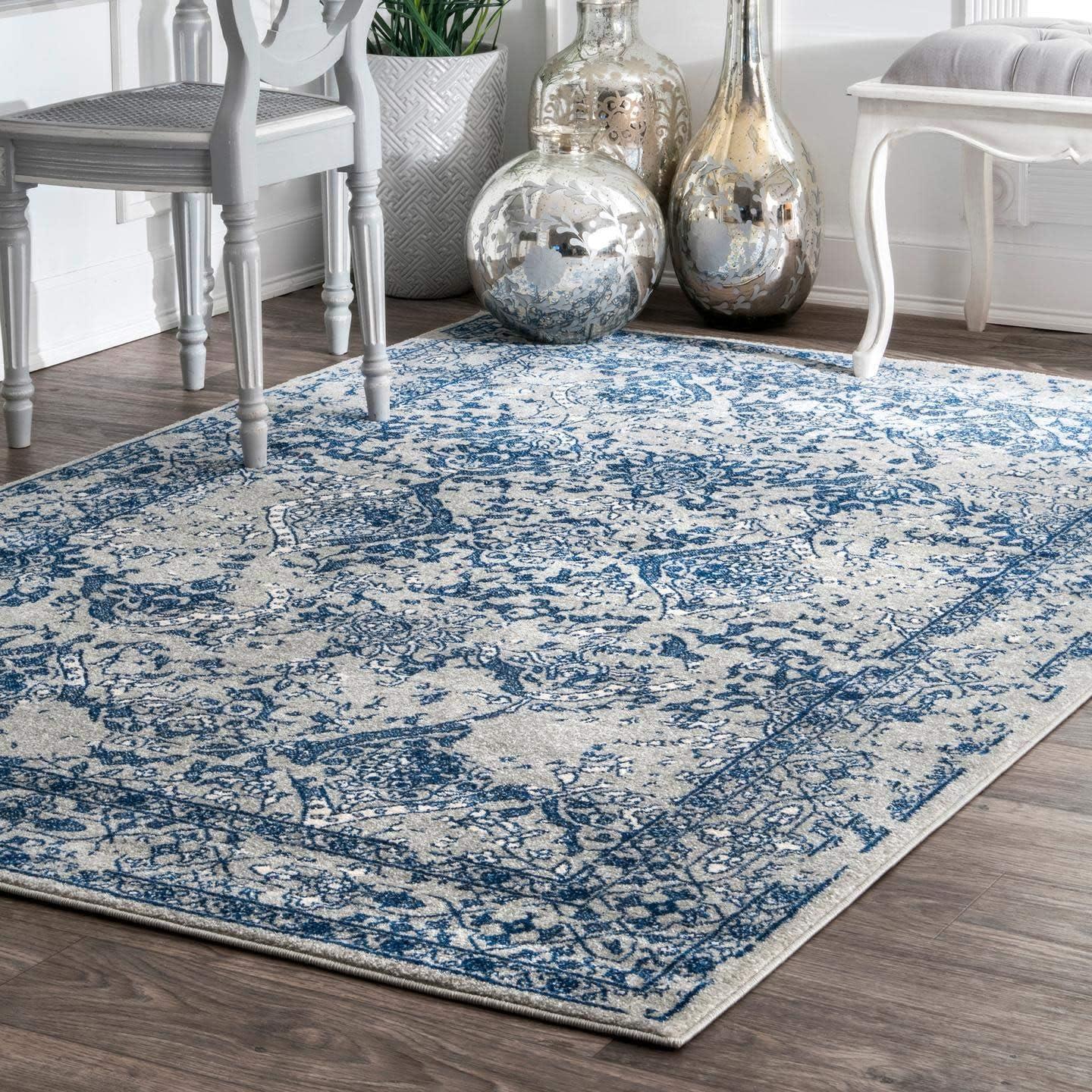 Odell Light Blue Floral Synthetic 5' x 7' Area Rug