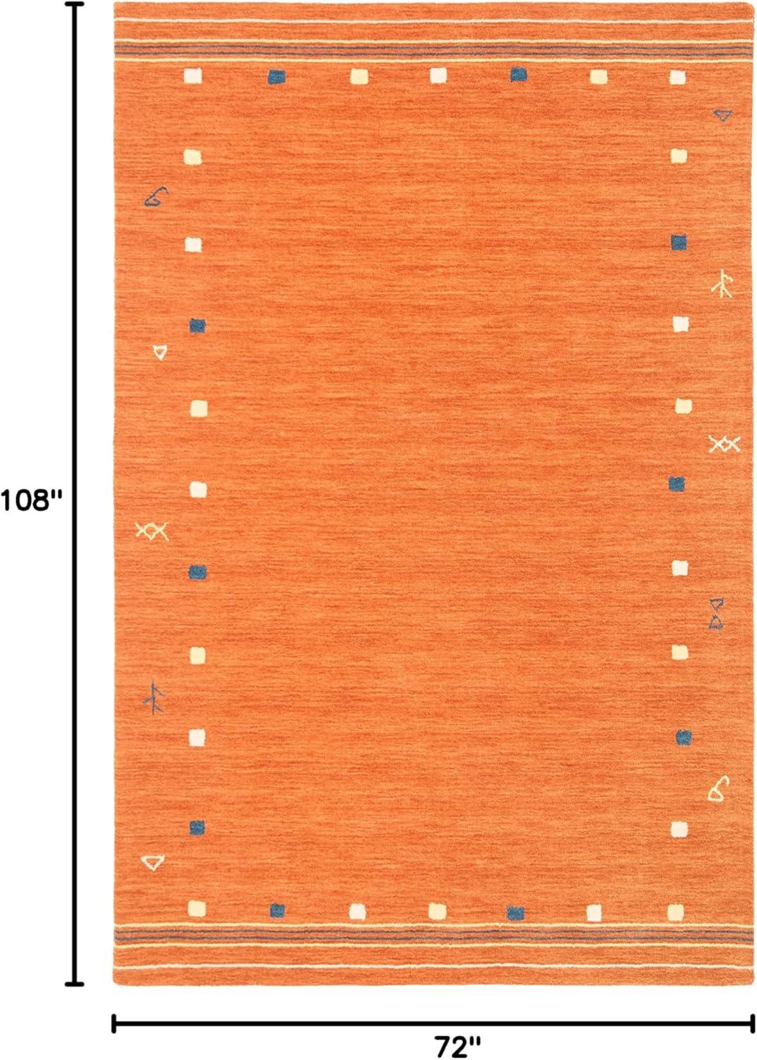 SAFAVIEH Himalaya Charmaine Solid Wool Area Rug, Blue, 6' x 9'