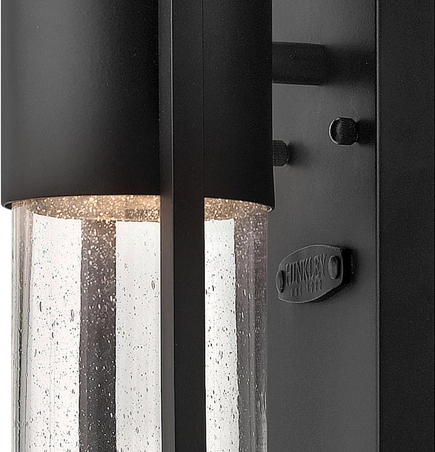 Sleek Black Outdoor Wall Sconce with Clear Seedy Glass