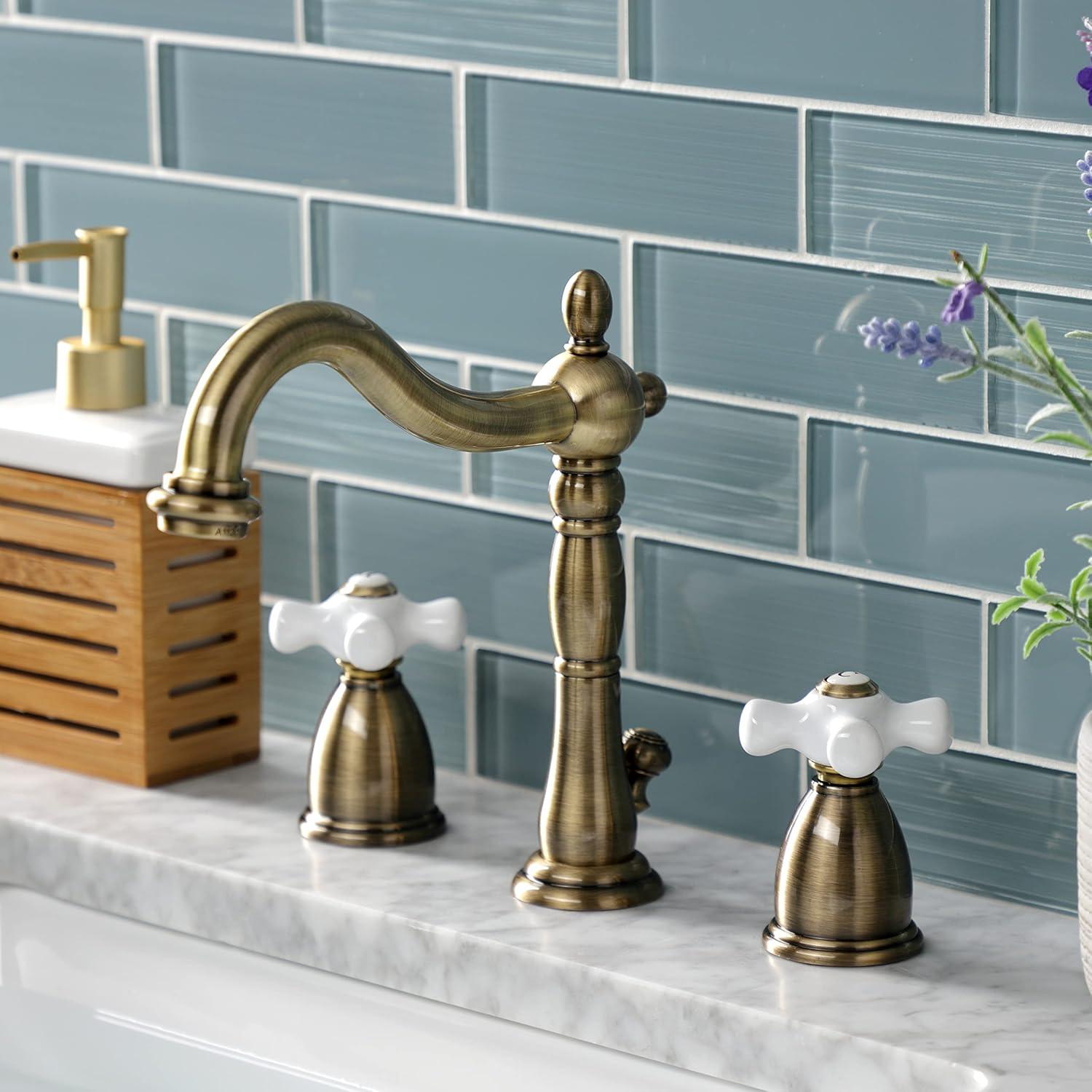 Kingston Brass Heritage Two-Handle 3-Hole Deck Mount Widespread Bathroom Faucet with Pop-Up Drain