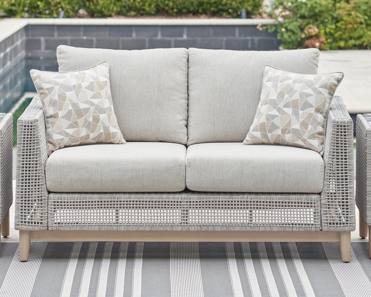 Gray Wicker and Plastic Outdoor Loveseat with Cushions