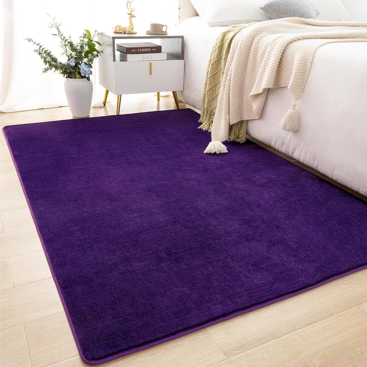 Athaniel Solid Color Machine Woven Polypropylene Area Rug in Purple