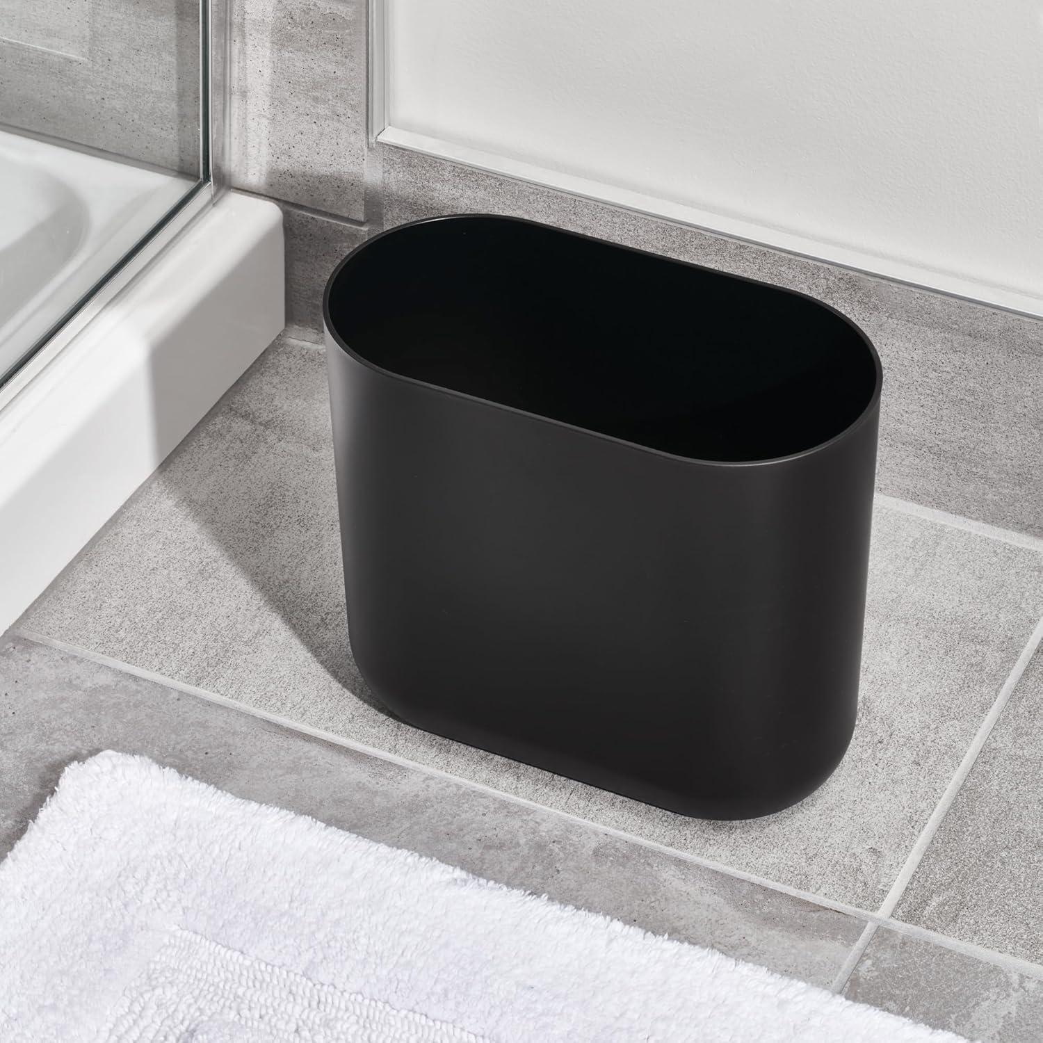 iDesign Slim Oval Plastic Waste Basket, The Cade Collection – 10.56” x 5.5” x 9.77”, Matte Black