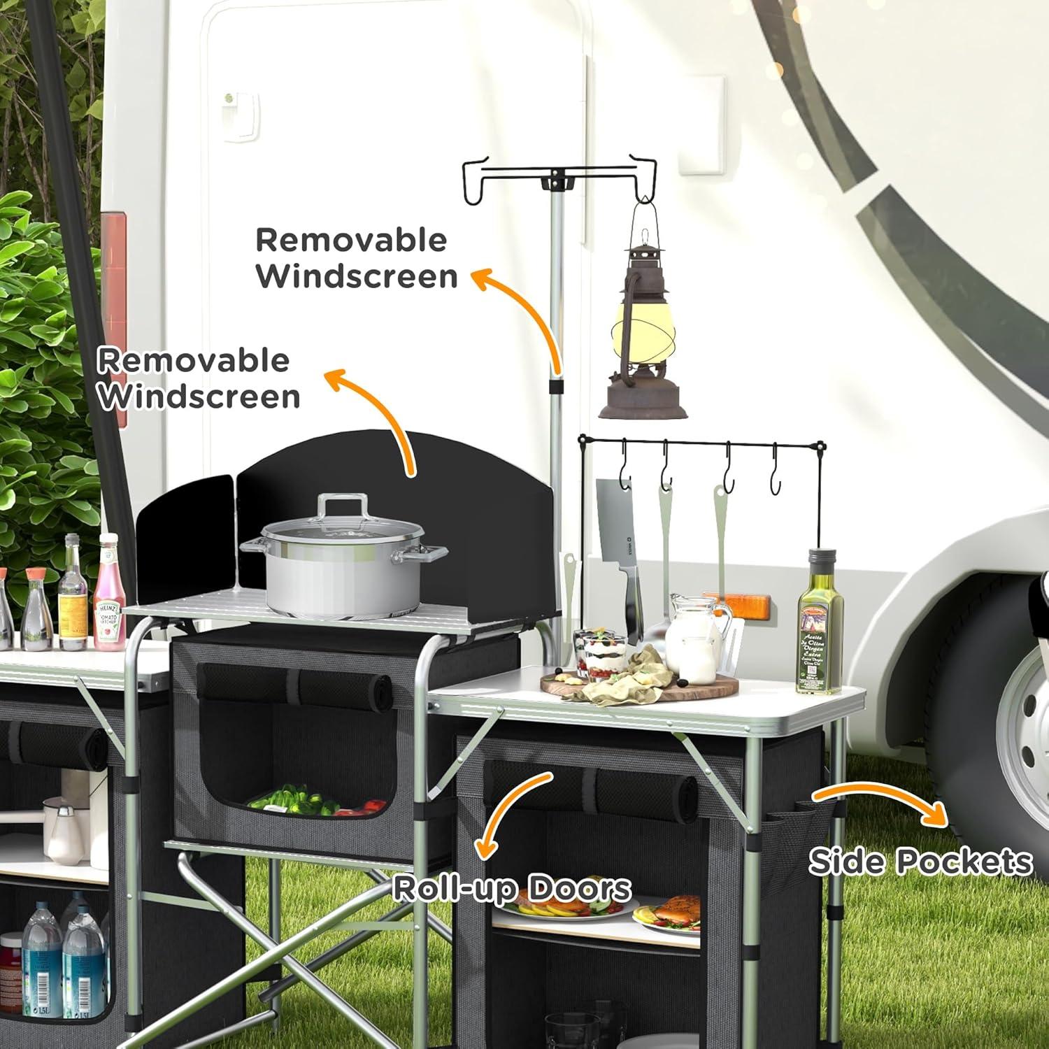 Outsunny Camping Kitchen Table, Portable Folding Camp Kitchen, Aluminum Cook Station with 3 Fabric Cupboards, Windshield, Carrying Bag, Black