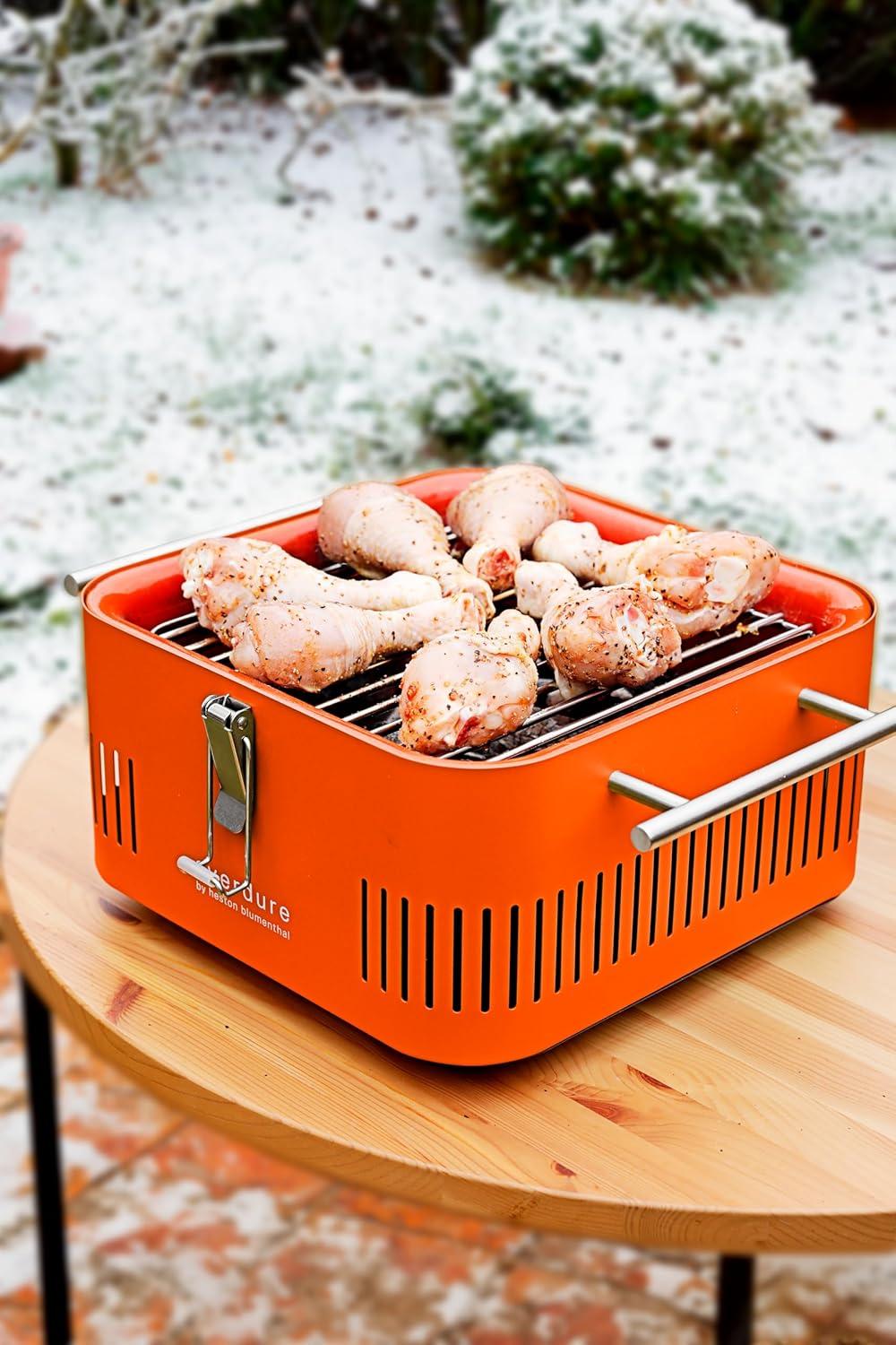 Everdure Orange Portable Charcoal Grill with Bamboo Board