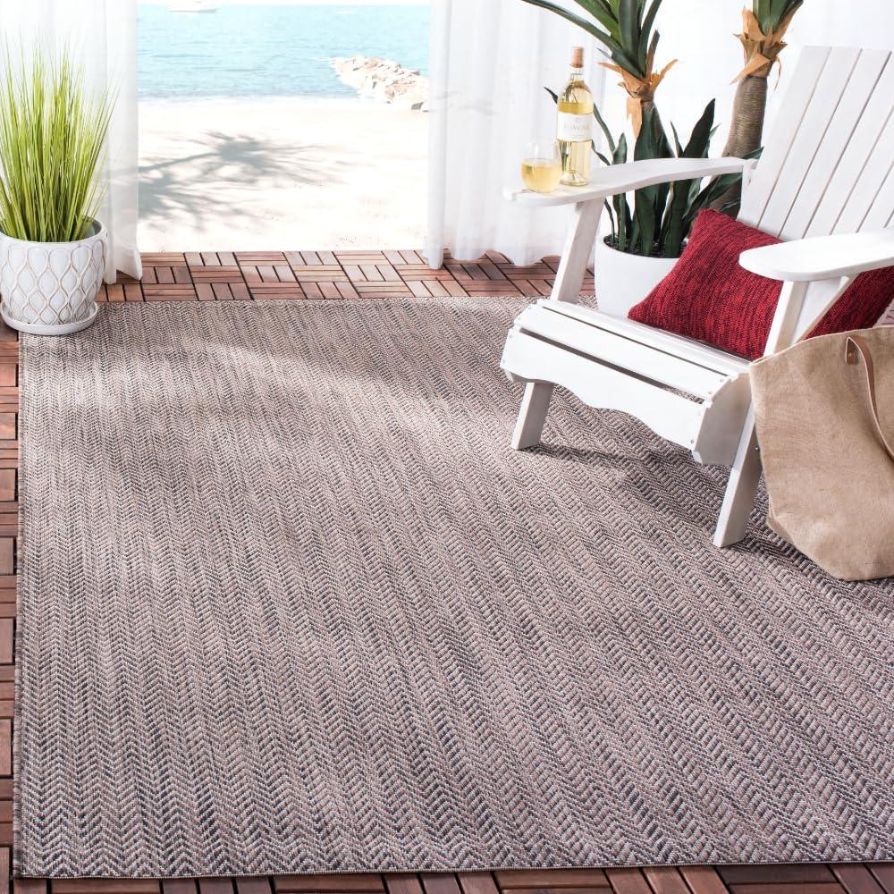 SAFAVIEH Courtyard Morven Chevron Stripes Indoor/Outdoor Area Rug, 6'7" x 9'6", Brown/Beige