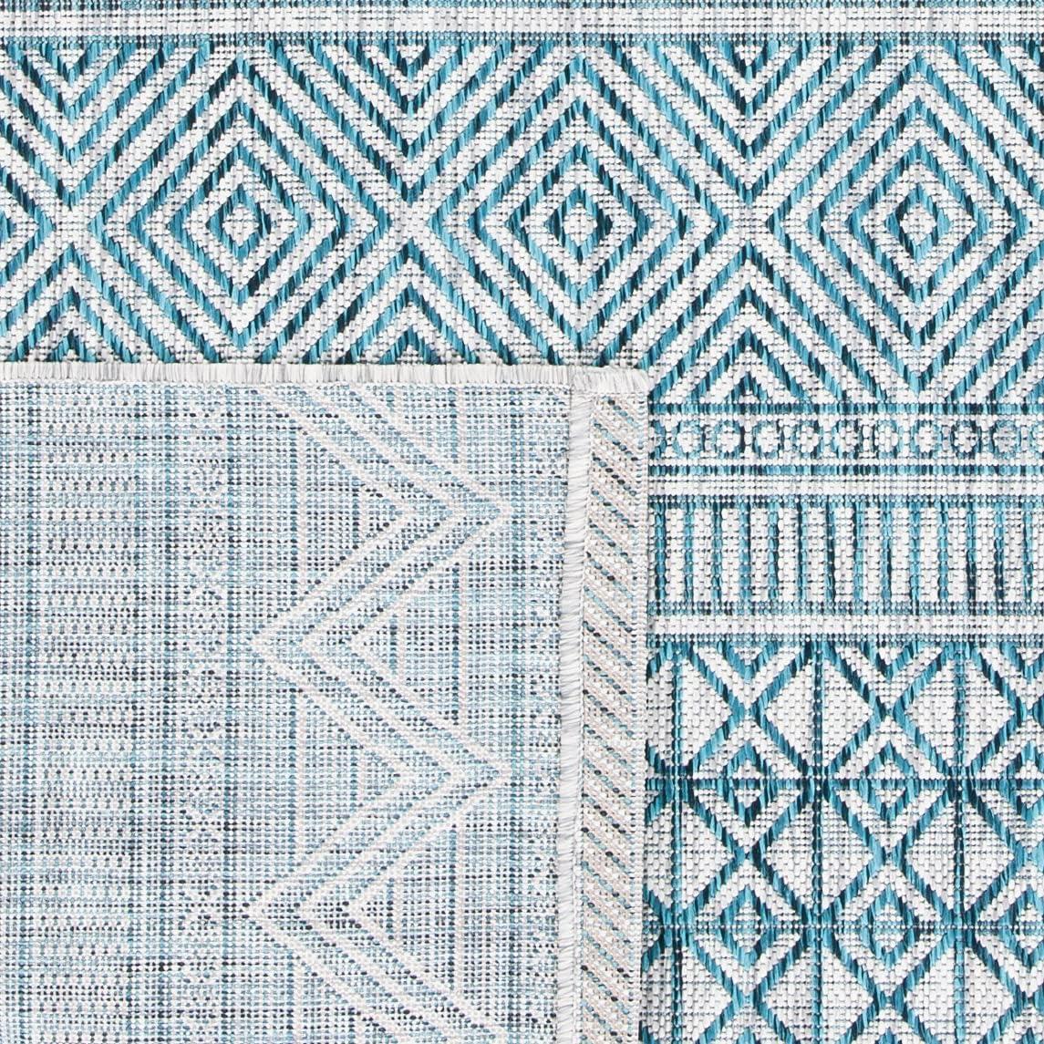 Grey and Teal 9' x 12' Synthetic Geometric Area Rug