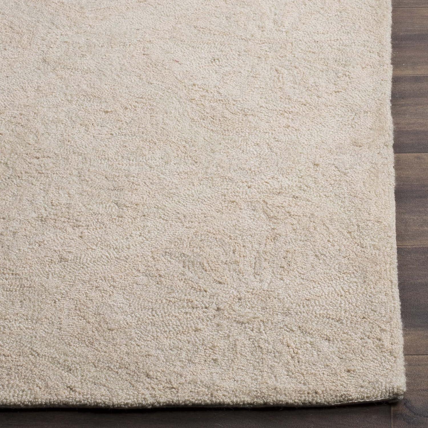 Taran Hand-Hooked Creme Area Rug