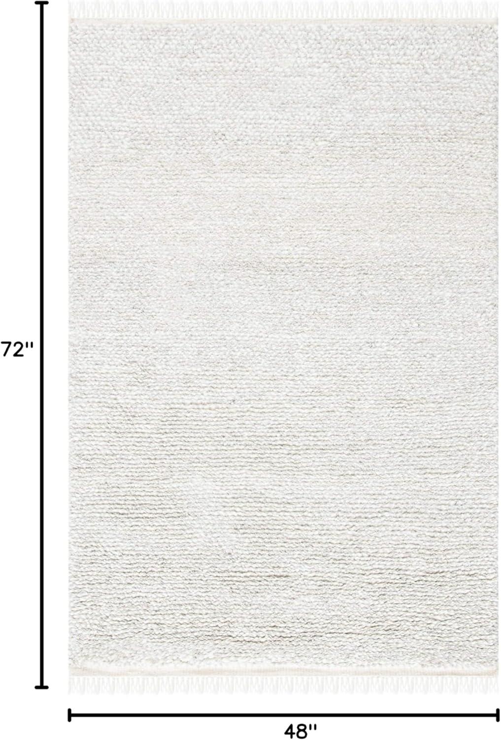 SAFAVIEH Casablanca Claud Solid Wool Shag Area Rug, Beige, 4' x 6'