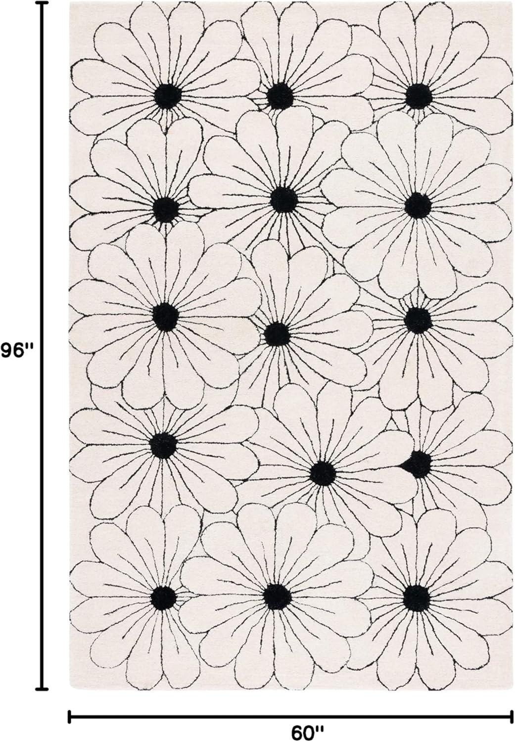 Ivory and Black Tufted Wool Floral 5' x 8' Area Rug