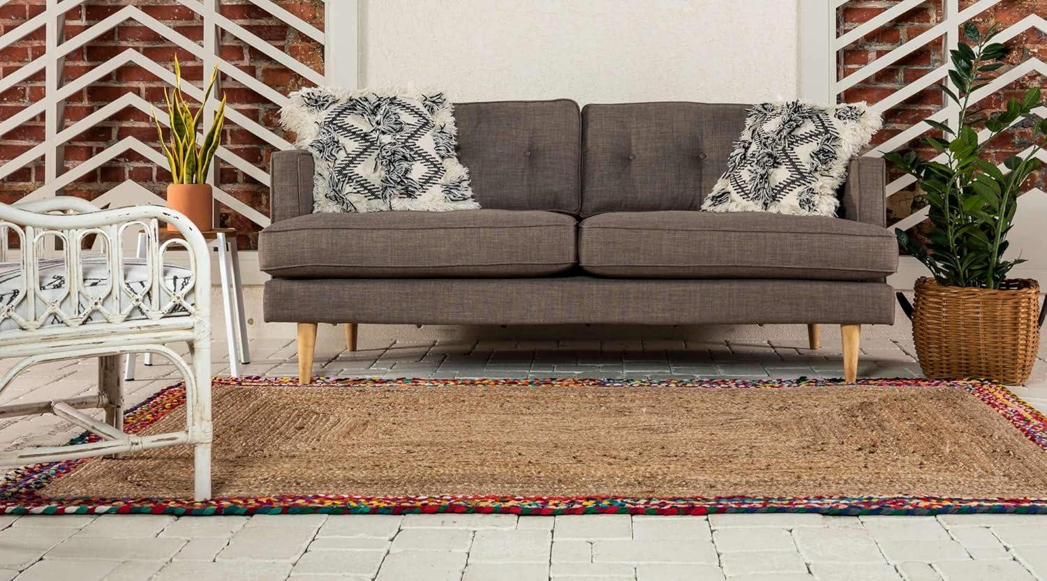 Hand-Braided Jute and Cotton Indoor Rug with Colorful Accents