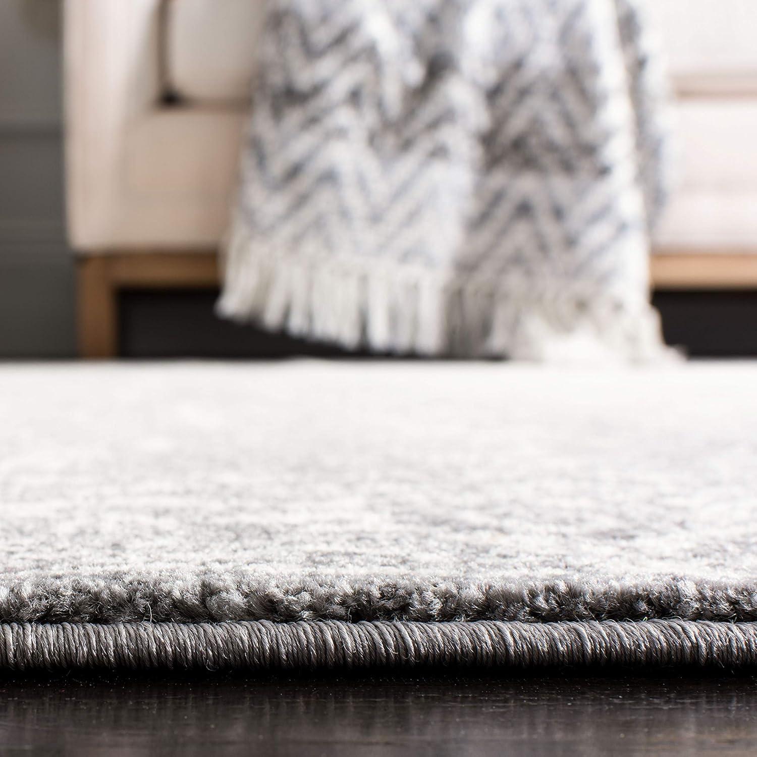 Evoke EVK270 Power Loomed Area Rug Charcoal / Ivory 5'-3" X 7'-6" - Safavieh.