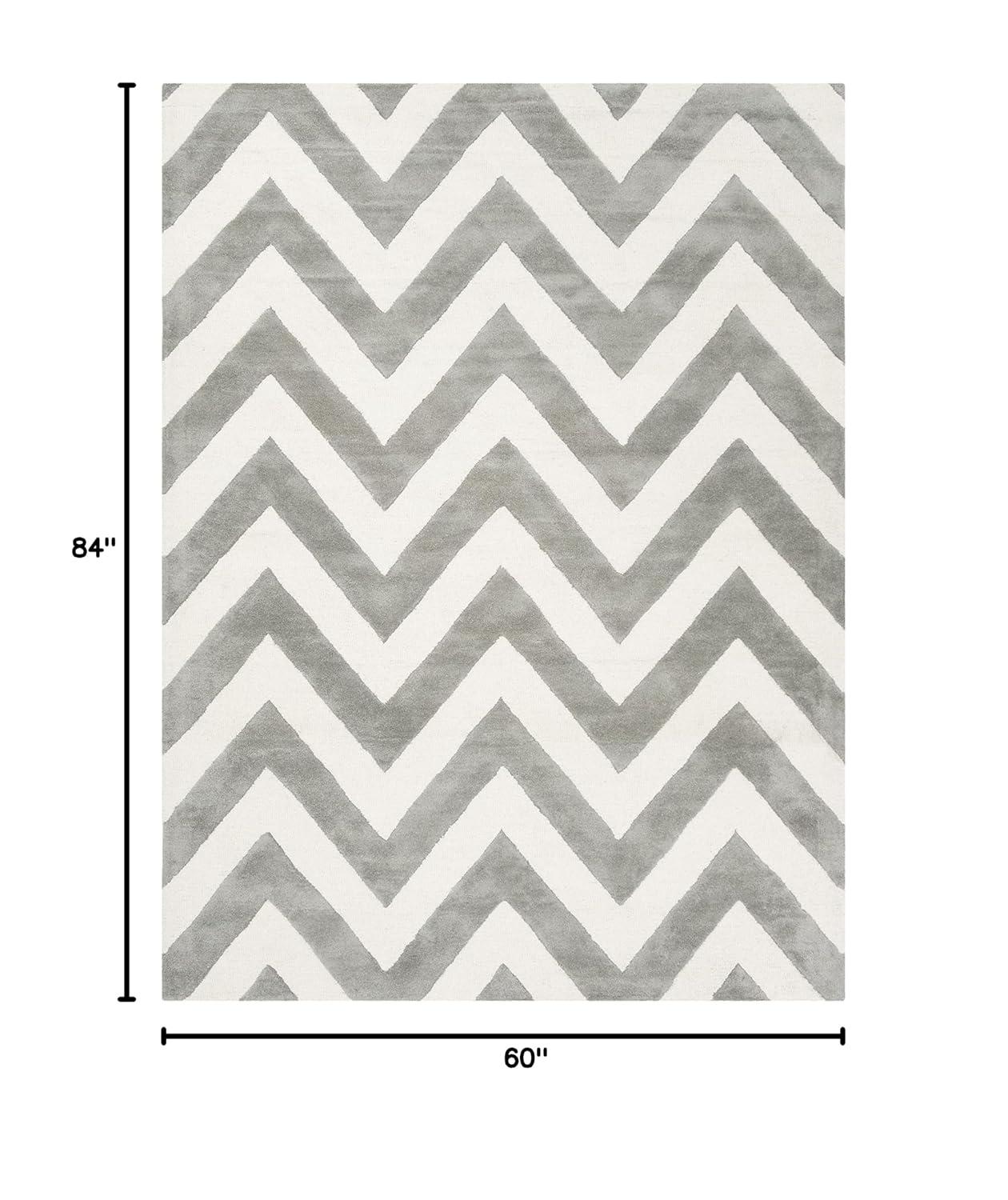 Safavieh Kids SFK921 Hand Tufted Area Rug - Grey/Ivory - 5'x7' - Safavieh.