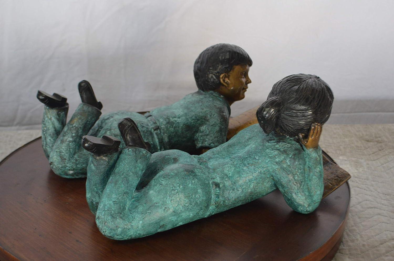 Set of a Boy and a Girl Reading a Book Bronze Statue - Size: 16"L x 7"W x 8"H.