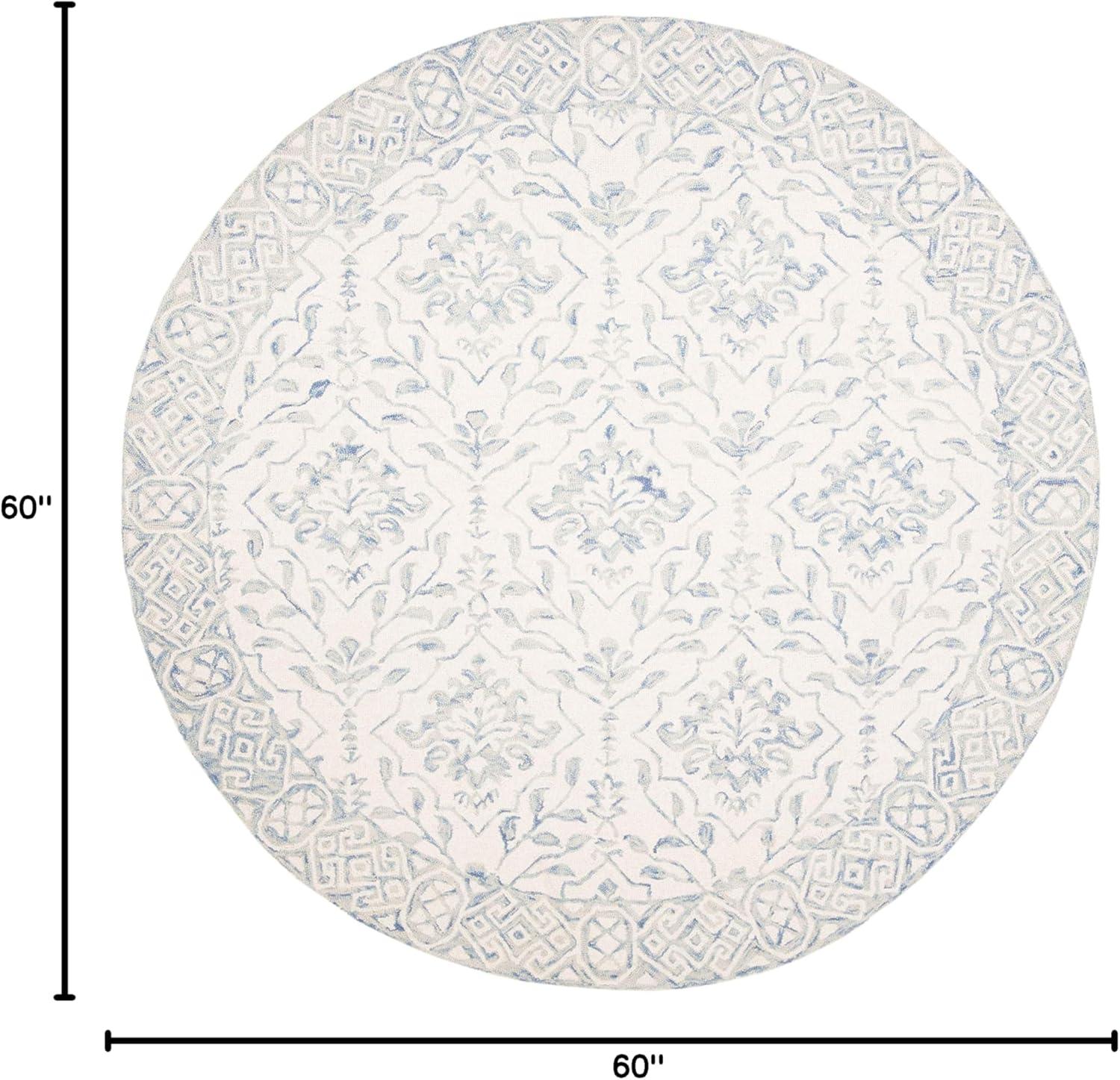 Handmade Light Blue and Ivory Tufted Wool Round Rug