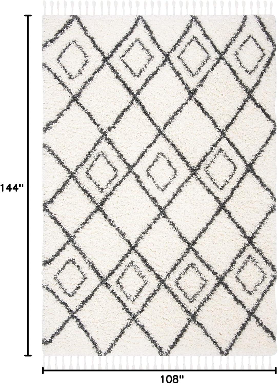 SAFAVIEH Moroccan Tassel Shag Comhgham Geometric Area Rug, Ivory/Dark Grey, 5'3" x 7'6"