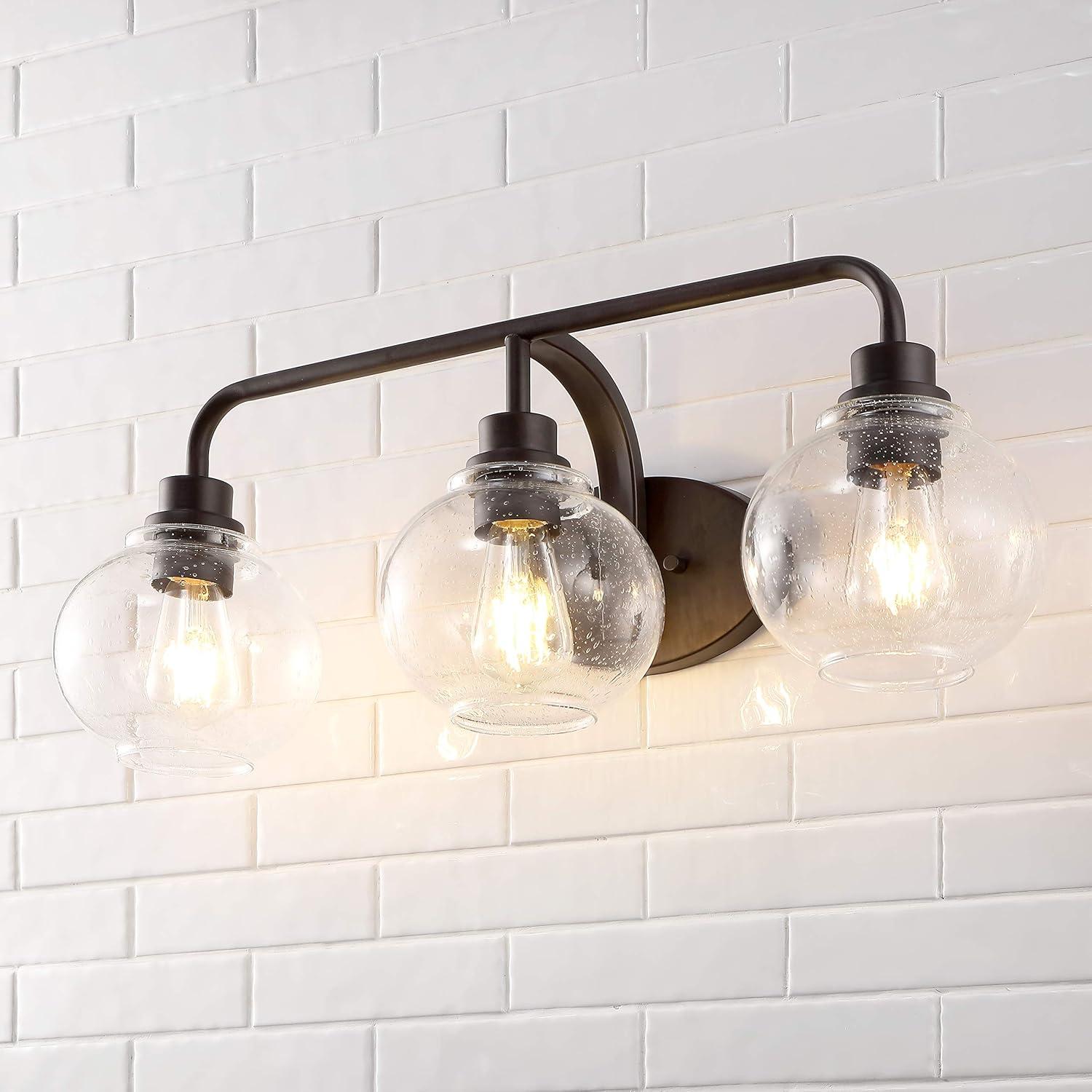 JONATHAN Y Sandrine 26.25" 3-Light Iron/Seeded Glass Cottage Rustic LED Vanity Light, Oil Rubbed Bronze