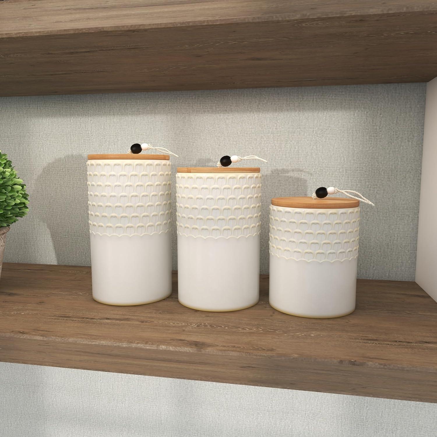 DecMode 9", 8", 7"H White Ceramic Textured Decorative Jars with Wood Lids and Beaded Accents, 3-Pieces