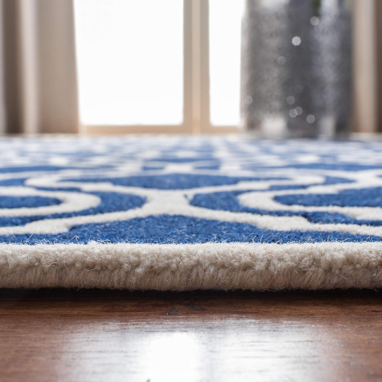 Hand-Tufted Dark Blue and Ivory Wool 8' x 10' Area Rug