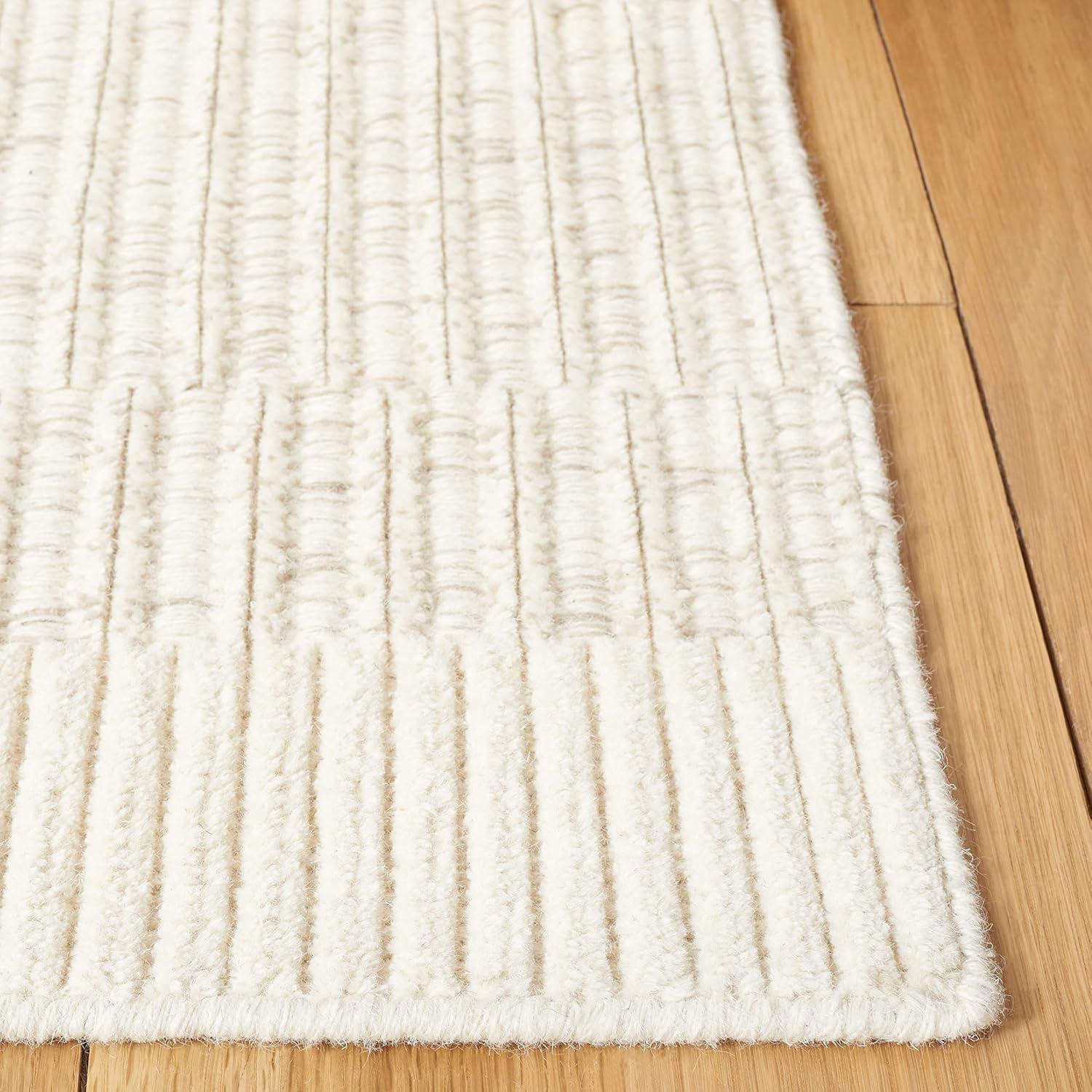 Ivory 8' x 10' Handmade Wool and Synthetic Tufted Rug