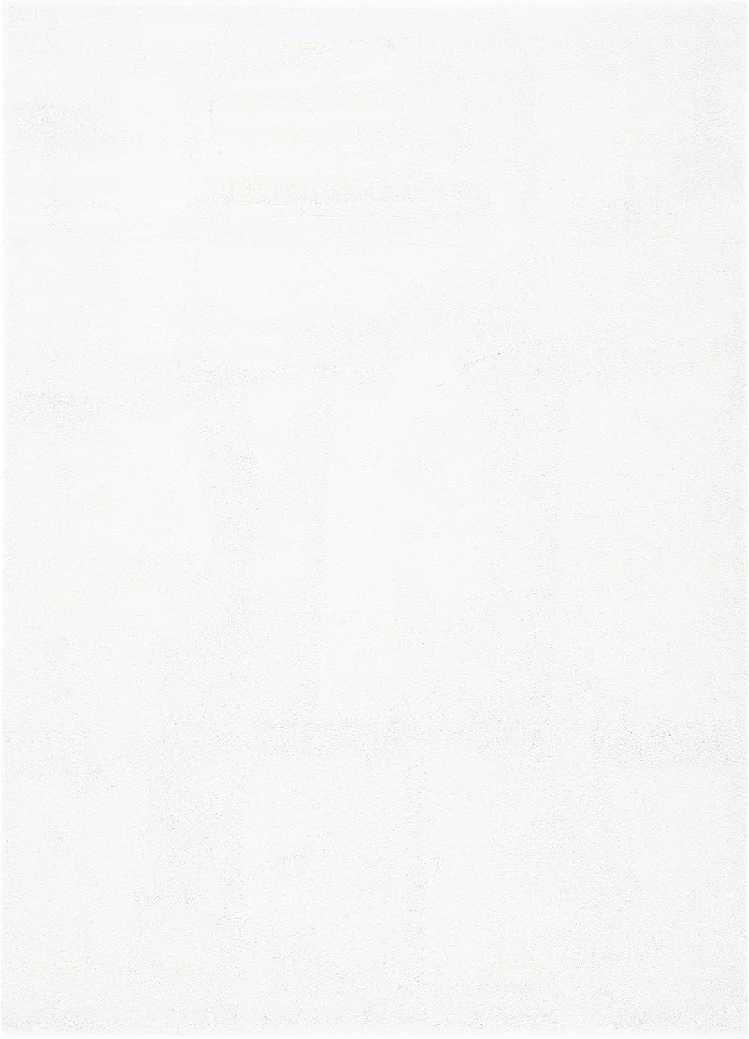 SAFAVIEH Plain and Solid Carleen Solid Plush Area Rug, Ivory, 4'5" x 6'5"