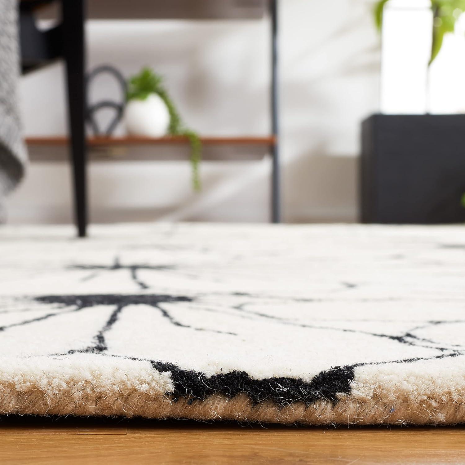 Ivory and Black Handmade Wool and Viscose Floral Rug