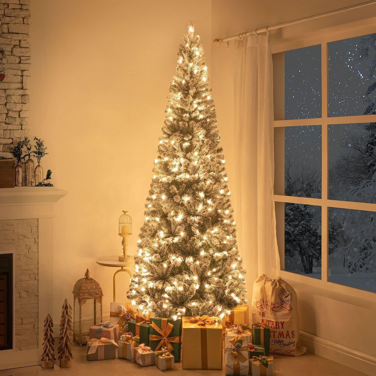 Salzburg 7.5ft Frosted Prelit Slim Artificial Christmas Tree with 1102 Branch Tips, 350 Warm Lights and Metal Stand, 34" wide Realistic Snow Flocked Skinny Pencil Christmas Tree by Naomi Home