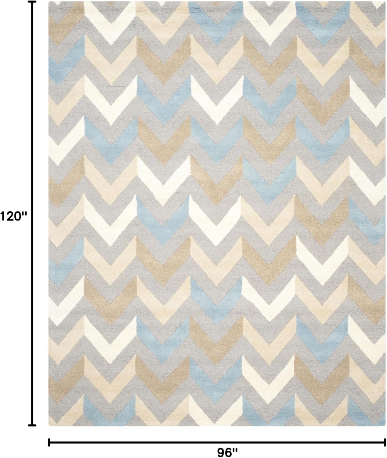 Cambridge CAM580 Hand Tufted Area Rug  - Safavieh