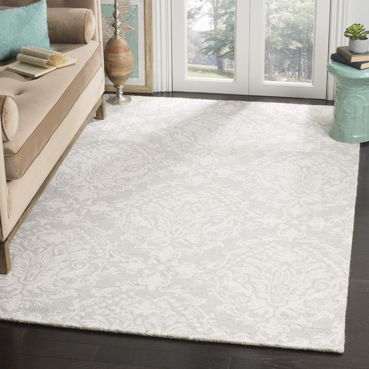 Handmade Floral Bliss Blue/Ivory Wool 5' x 8' Tufted Area Rug