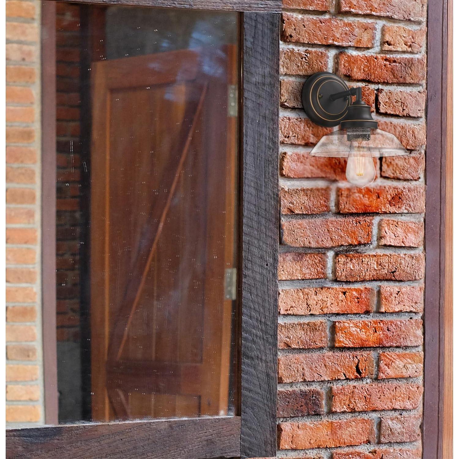 Westinghouse Lighting  Iron Hill One-Light Indoor Wall Fixture - 1-Light Oil Rubbed Bronze with Seeded Glass