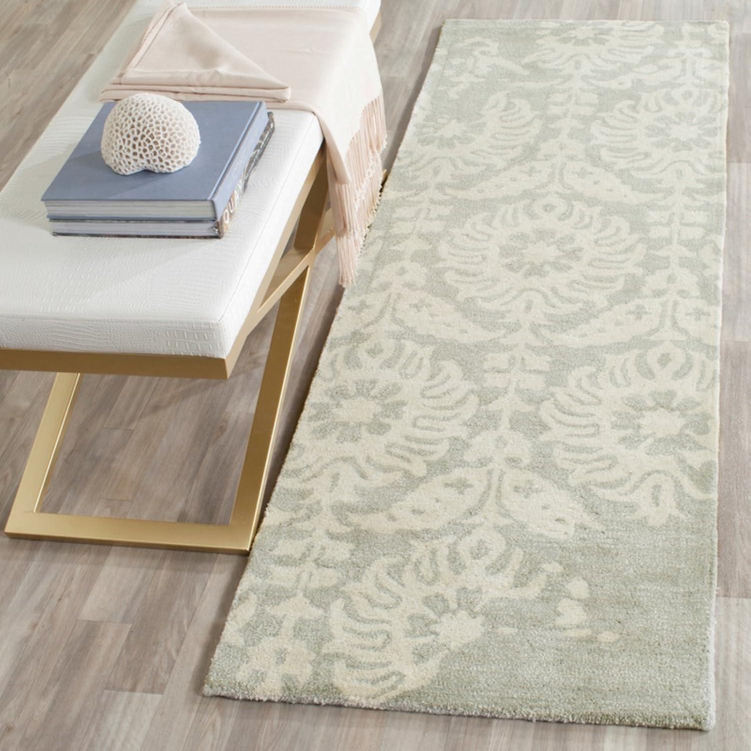 Light Grey and Ivory Hand-Tufted Wool 6' x 9' Area Rug