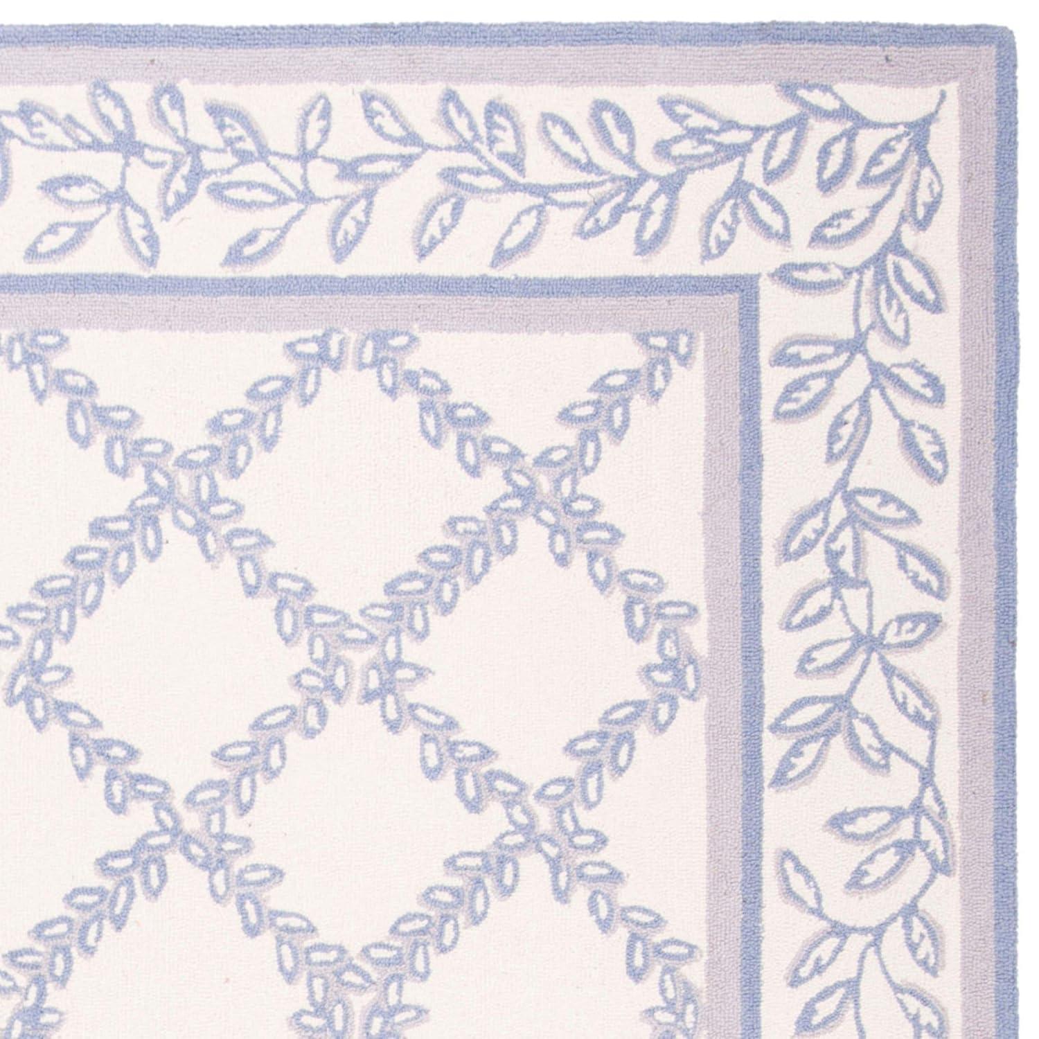 SAFAVIEH Chelsea Alecia Geometric Borders Wool Area Rug, Ivory/Light Blue, 8'9" x 11'9"
