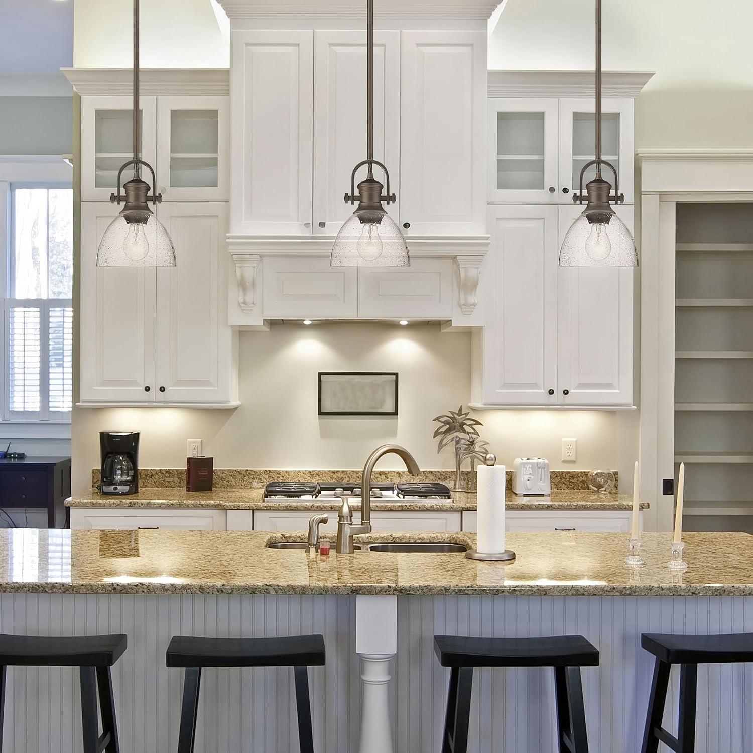 Golden Lighting Hines 1-Light Mini Pendant in Rubbed Bronze with Seeded Glass