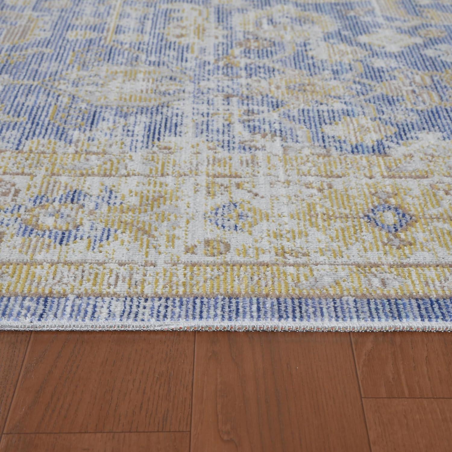 Loomed Vintage Light Blue Polyester 2'x3' Accent Rug