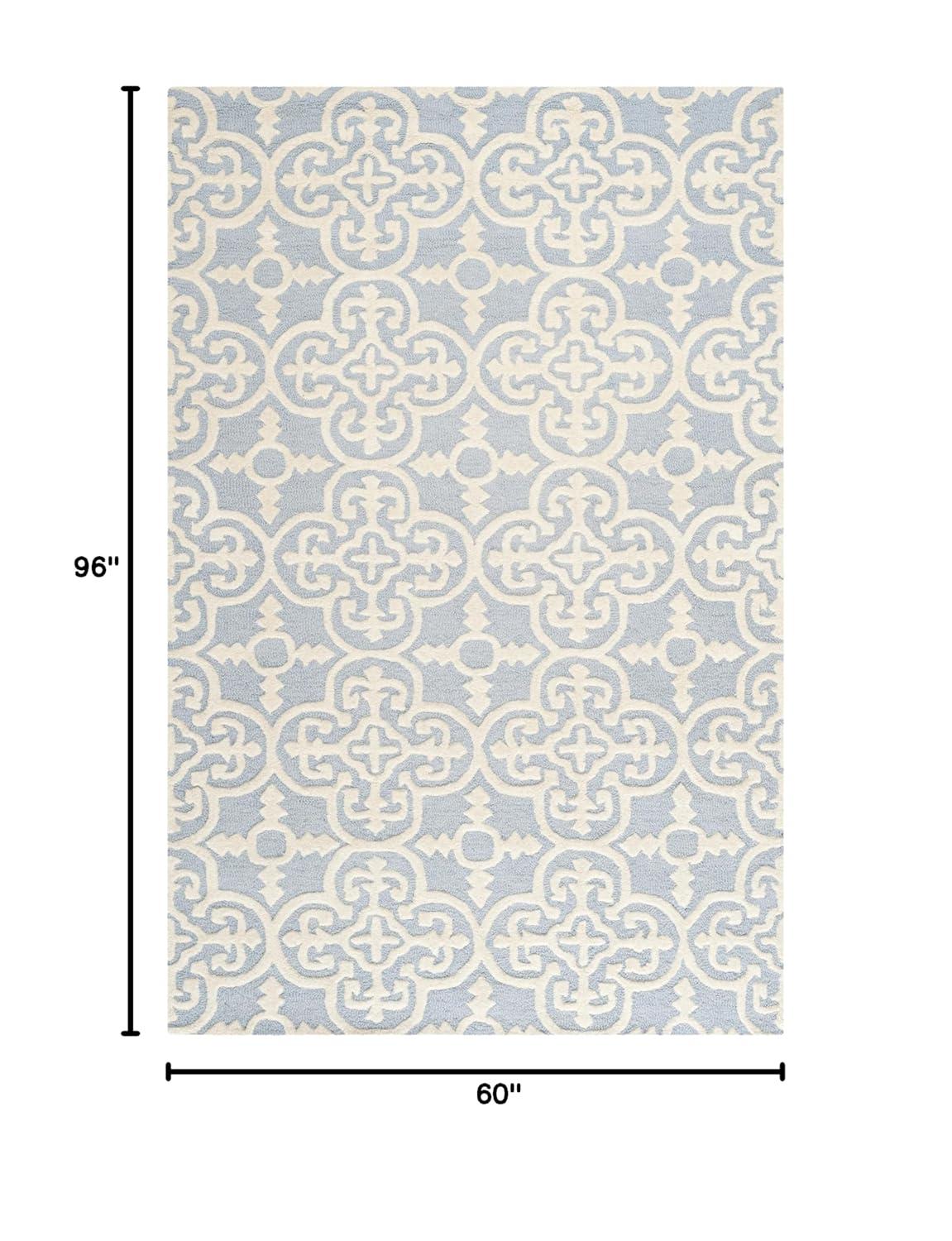 Cambridge CAM133 Hand Tufted Area Rug  - Safavieh
