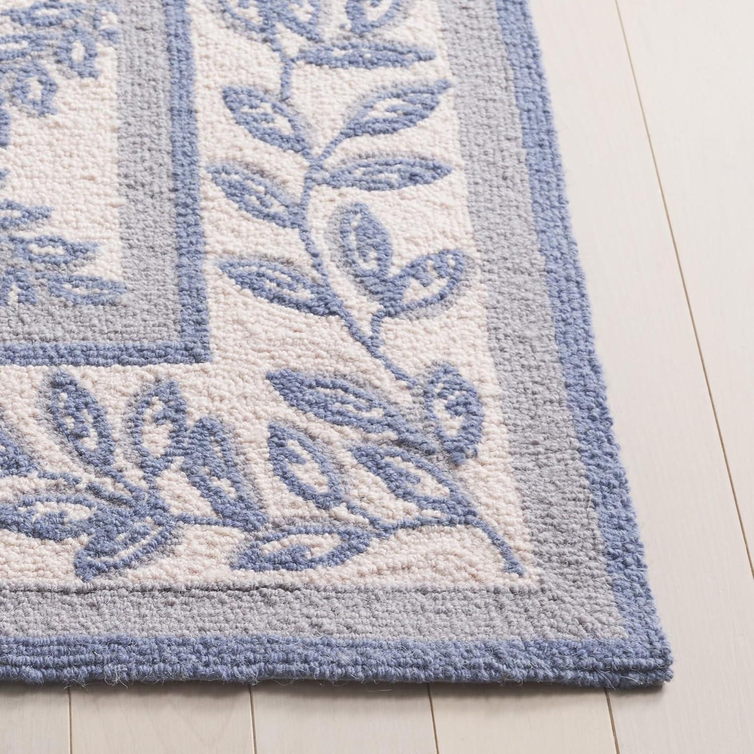 SAFAVIEH Chelsea Alecia Geometric Borders Wool Area Rug, Ivory/Light Blue, 8'9" x 11'9"