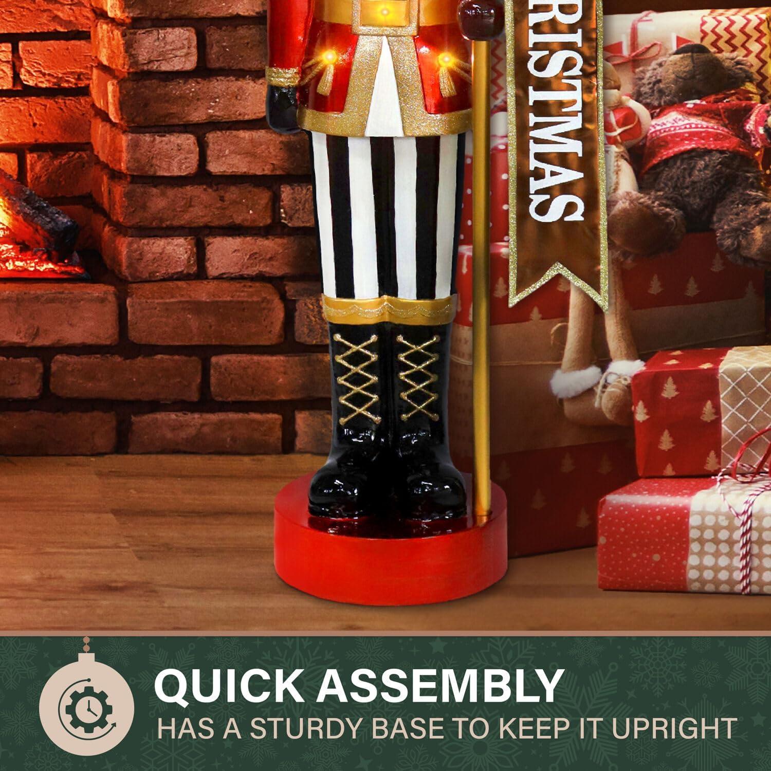 Fraser Hill Farm 4-Ft. Metallic Nutcracker Holding Banner Statue with LED Lights