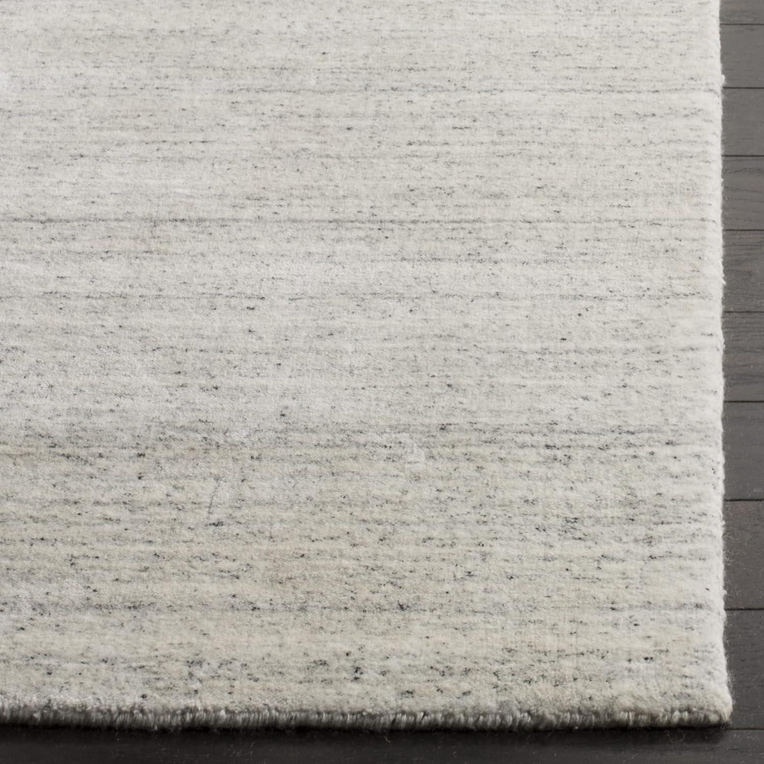 SAFAVIEH Mirage Branislav Solid Area Rug, Silver, 9' x 12'