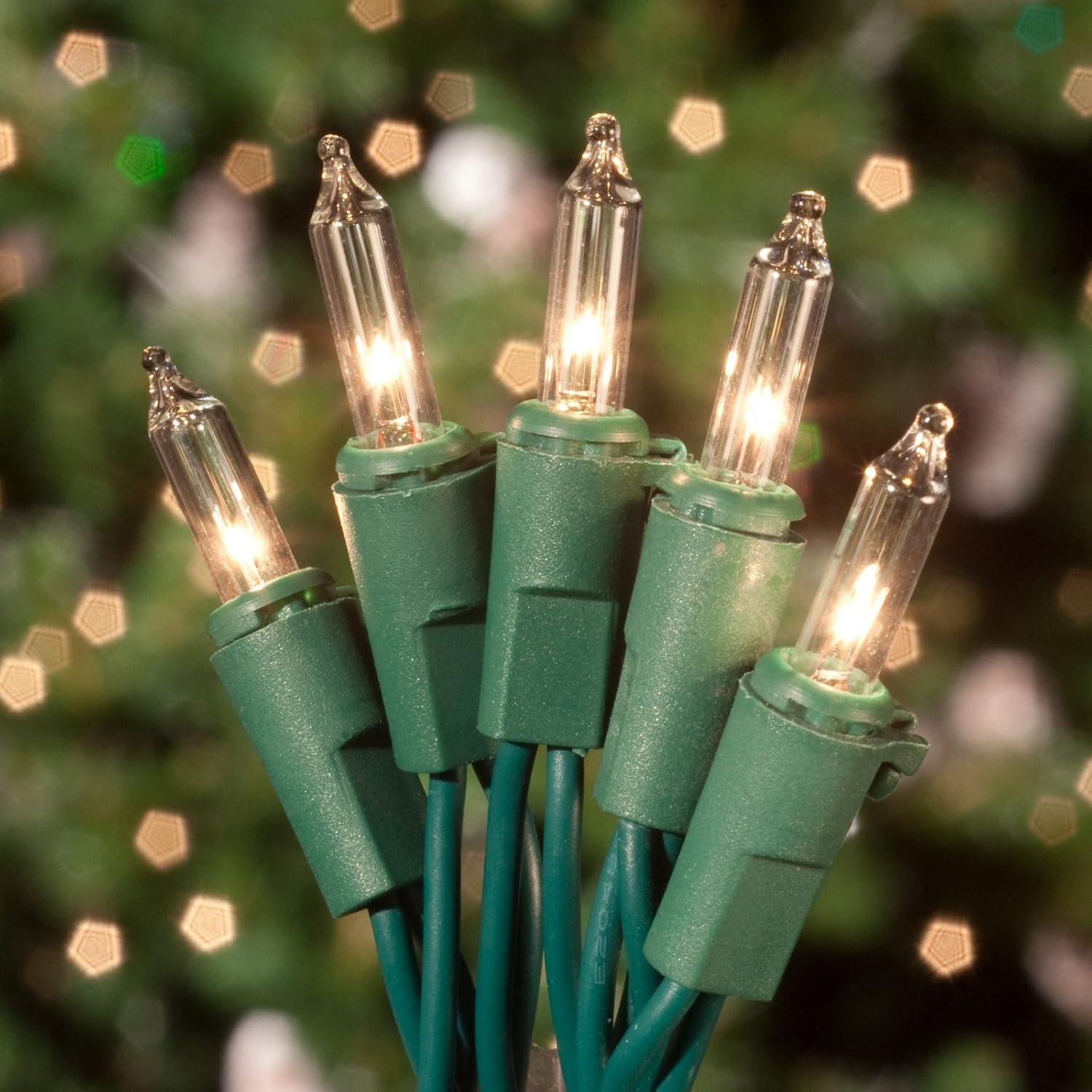 Holiday Essence Chasing Christmas Lights, 8 Function Controller 140 Clear Mini Bulbs Green Wire Indoor String Lights, 31.2 Feet Long Holiday Decor