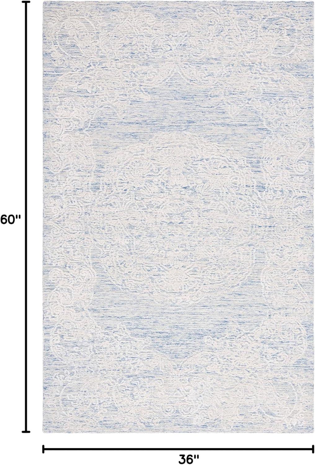 Charlton Home® Batha Hand Tufted Wool/Bamboo Silk/Cotton with Cotton Backing Rug in Blue/Ivory