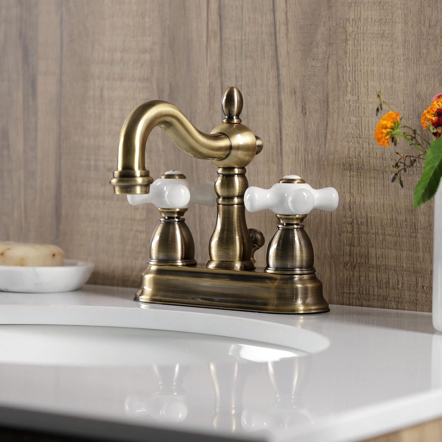 Kingston Brass Heritage Two-Handle 3-Hole Deck Mount 4" Centerset Bathroom Faucet with Plastic Pop-Up