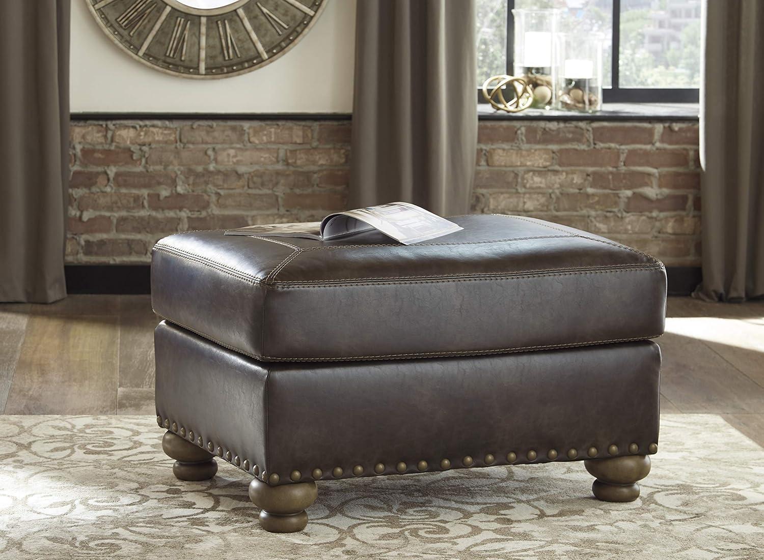 Brown Faux Leather Ottoman with Gold Nailhead Trim