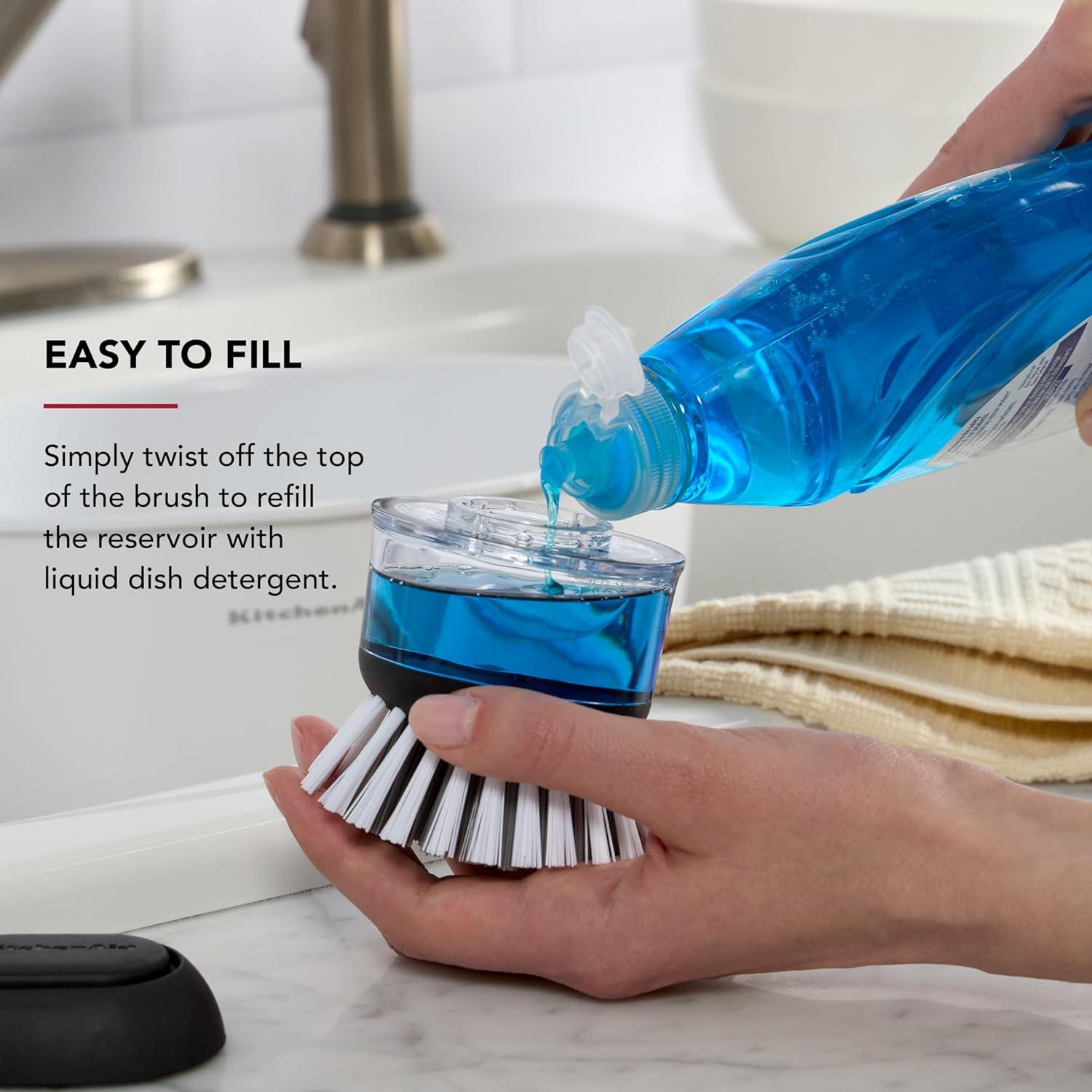 Black and Clear Plastic Soap Dispensing Palm Brush