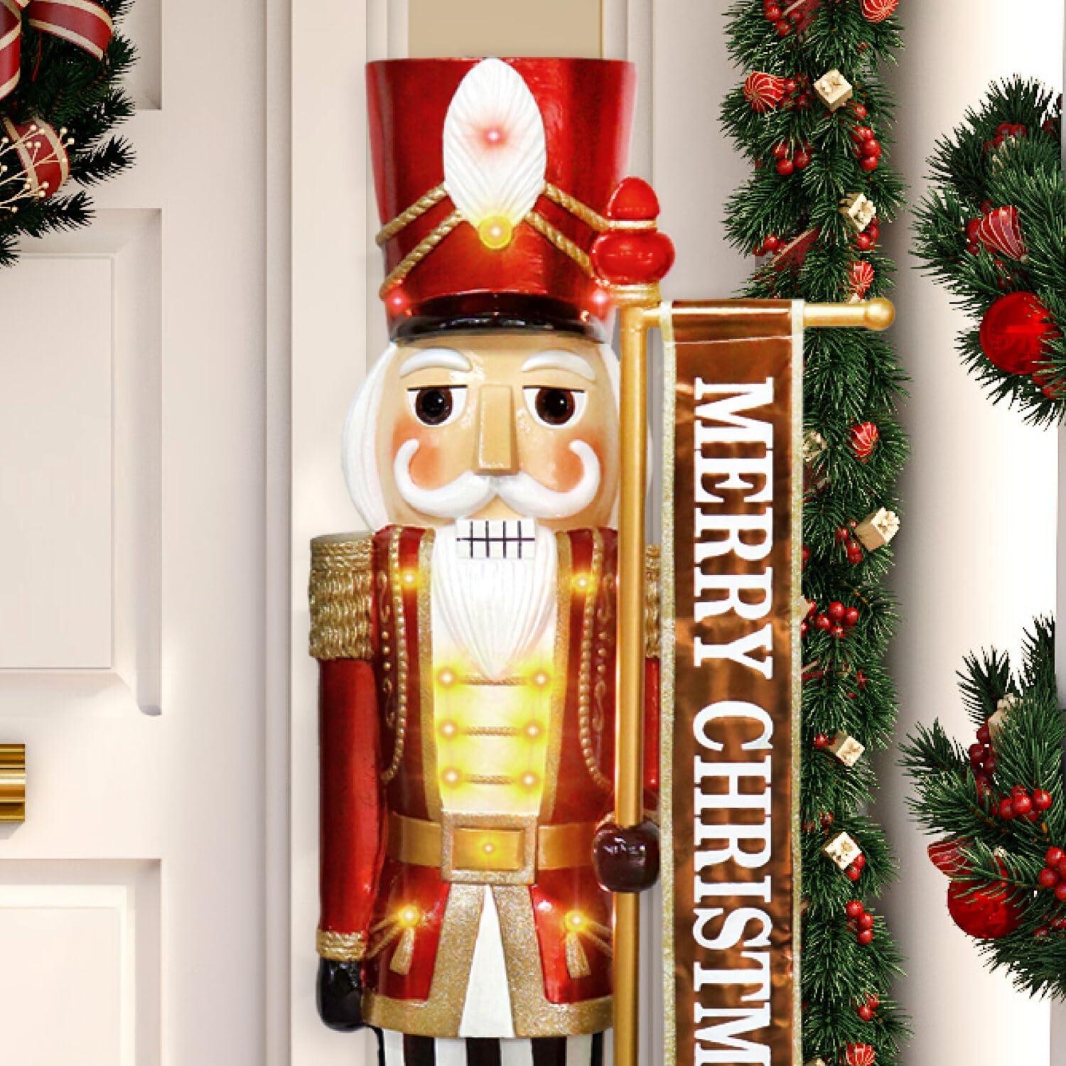 Fraser Hill Farm 4-Ft. Metallic Nutcracker Holding Banner Statue with LED Lights